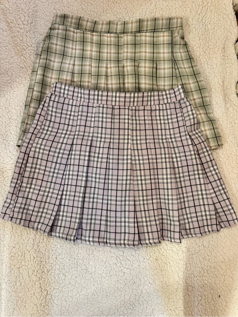 Set of two Charlotte Russe Plaid Pleated Mini Skirts - Sage Green & Pale Pink